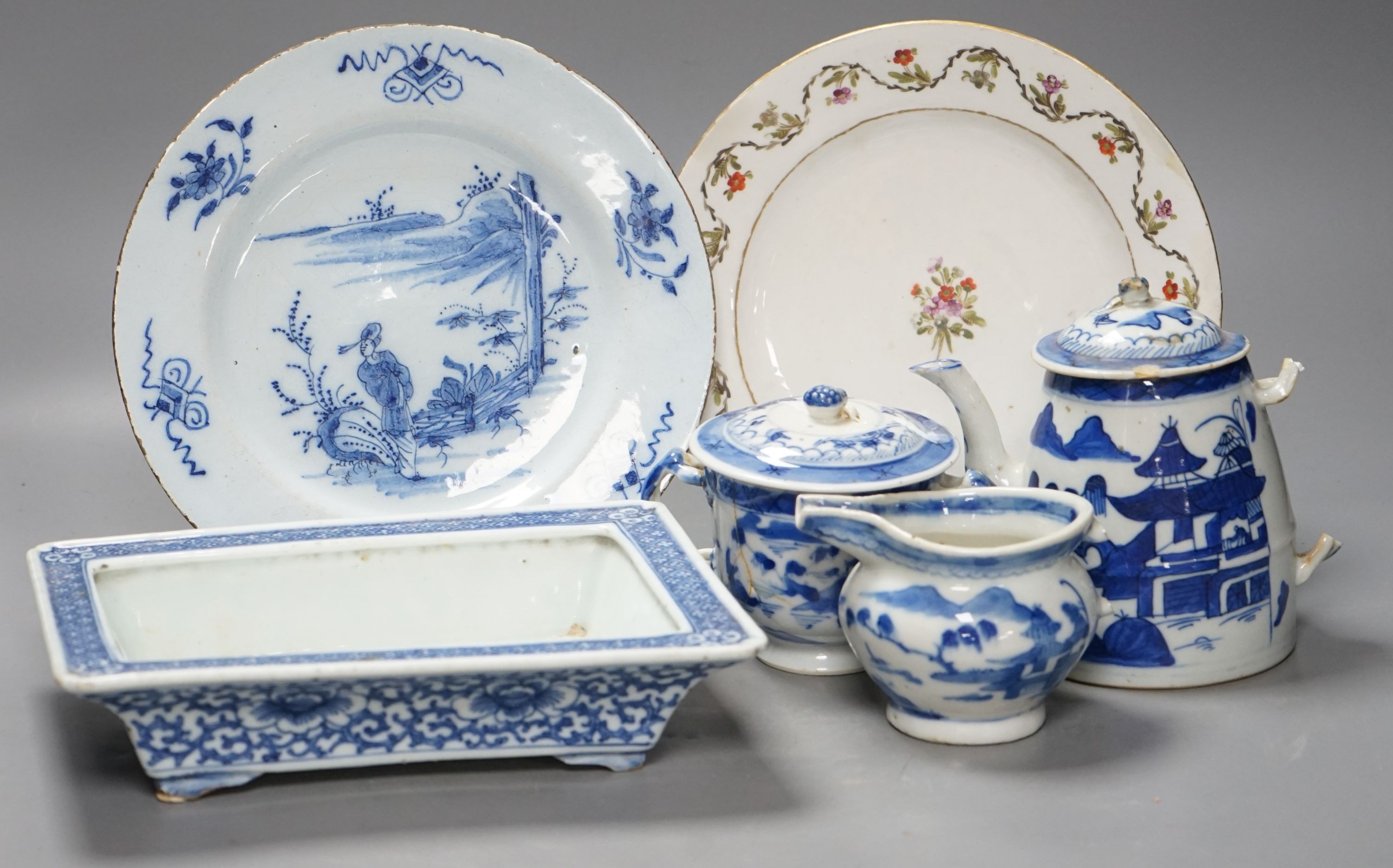 A Chinese blue and white bulb dish and a three piece teaset, a Delft plate and an English porcelain plate, 18th/19th century 23cm